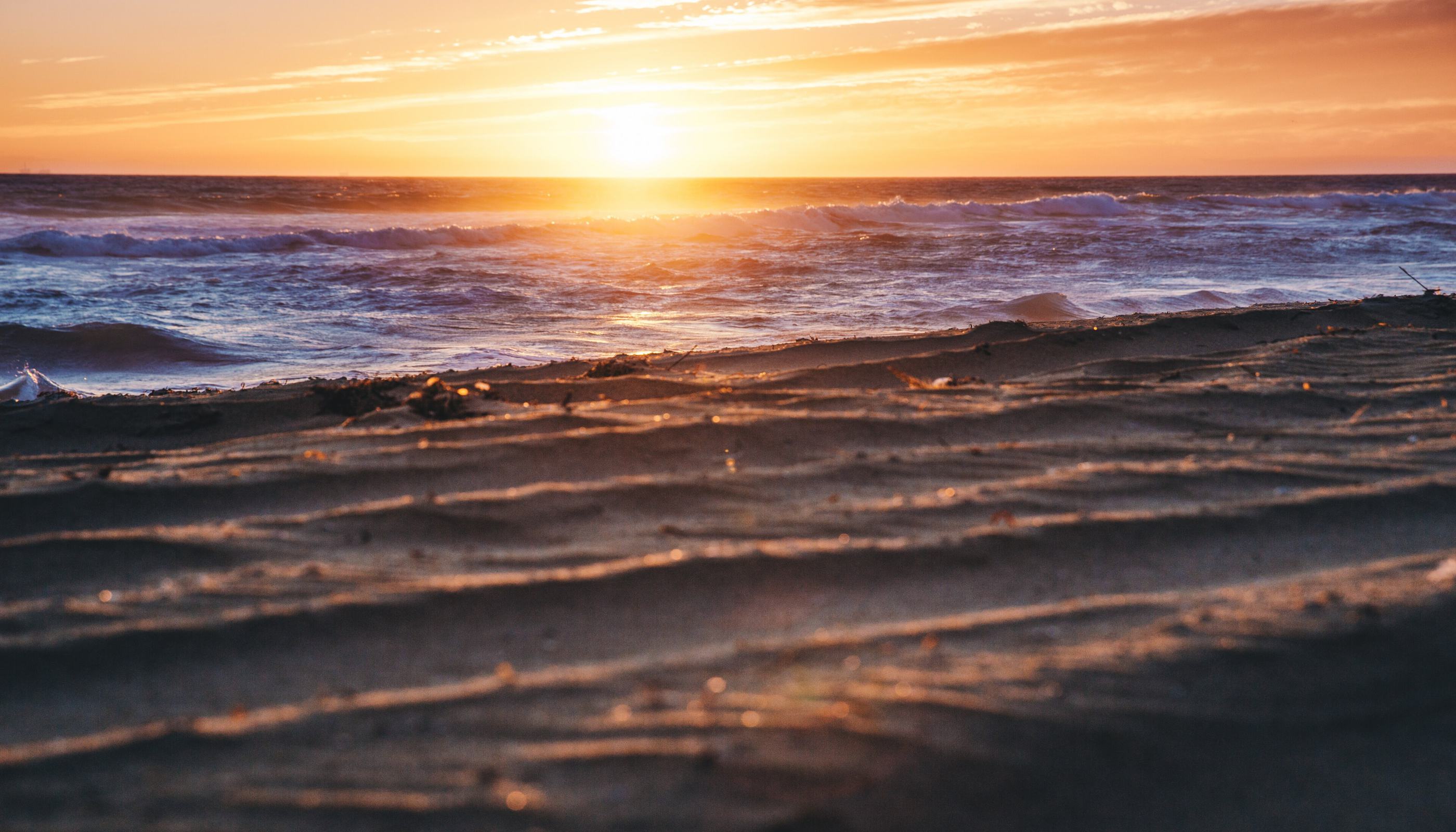 Low evening light across the surface of the sea