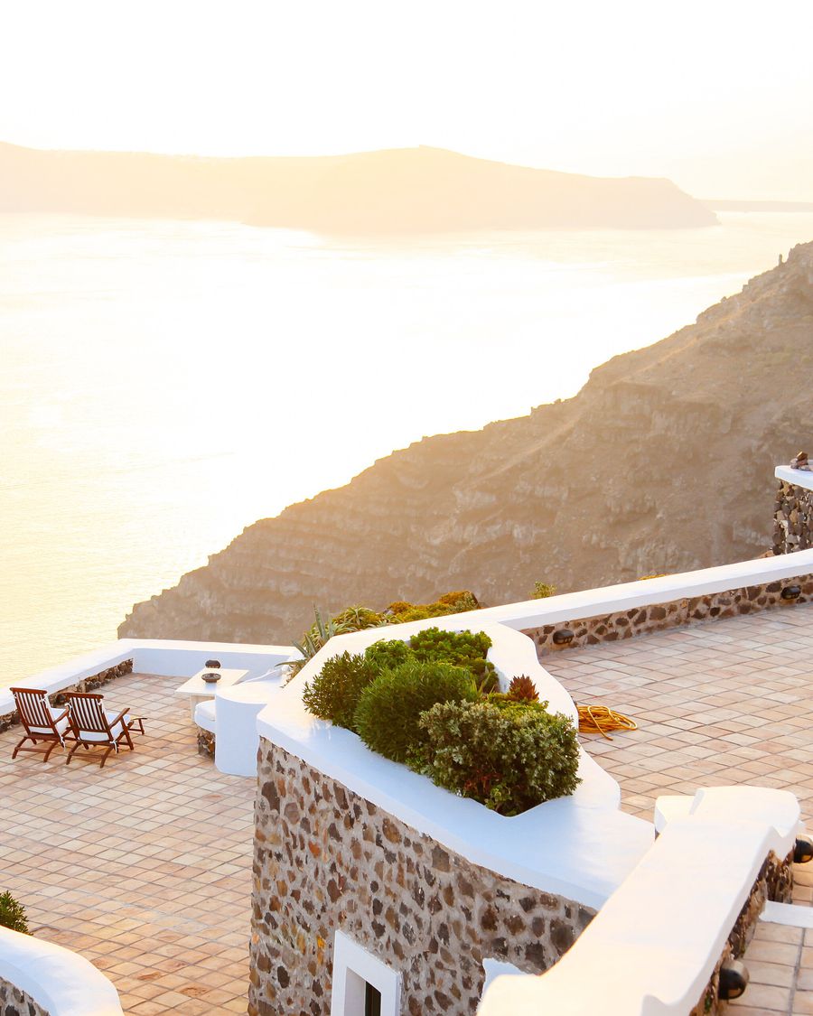 Whitewashed buildings above the sea in Santorini